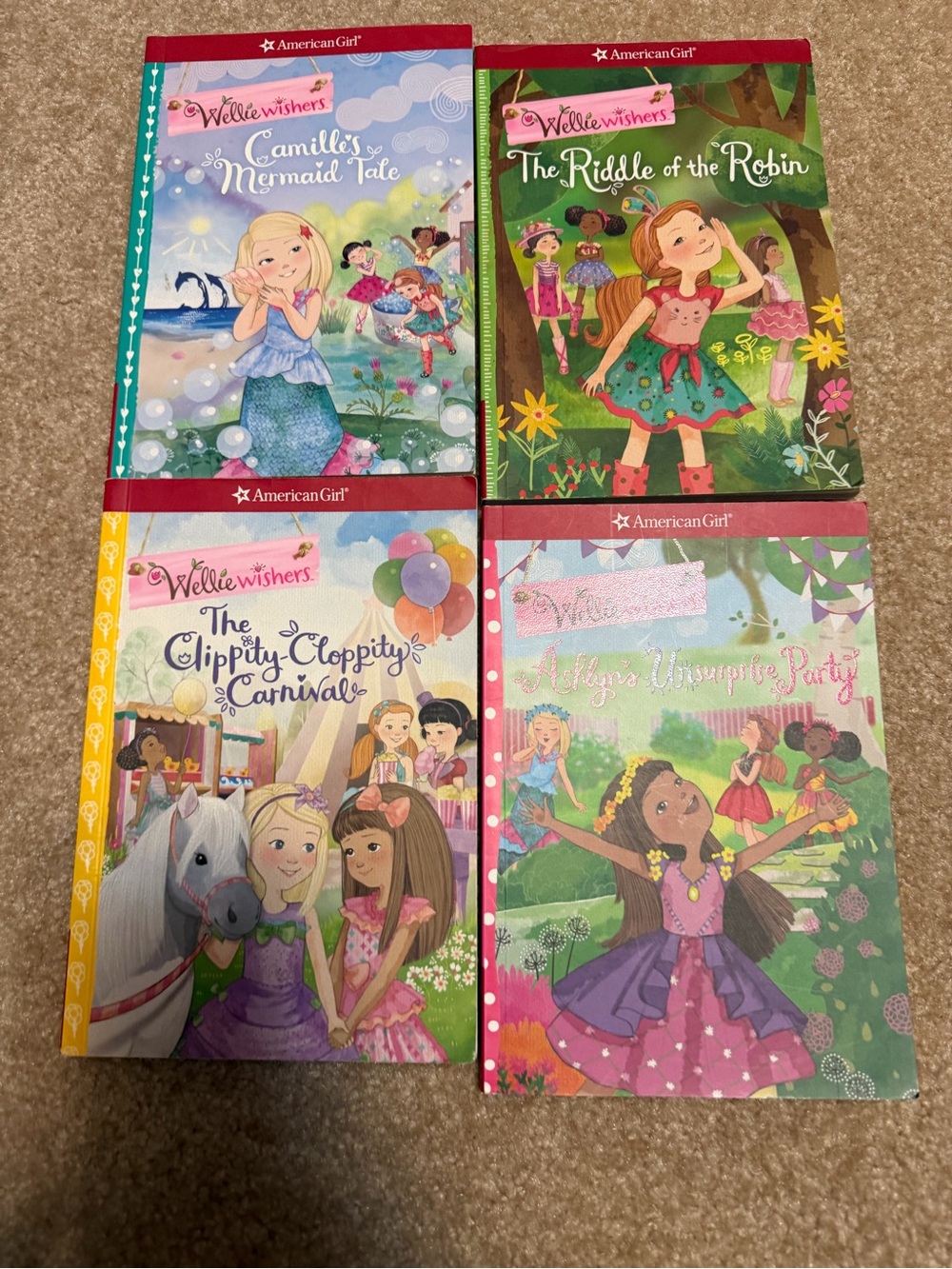 Lot of four paperback books from the American Girl WellieWishers series
